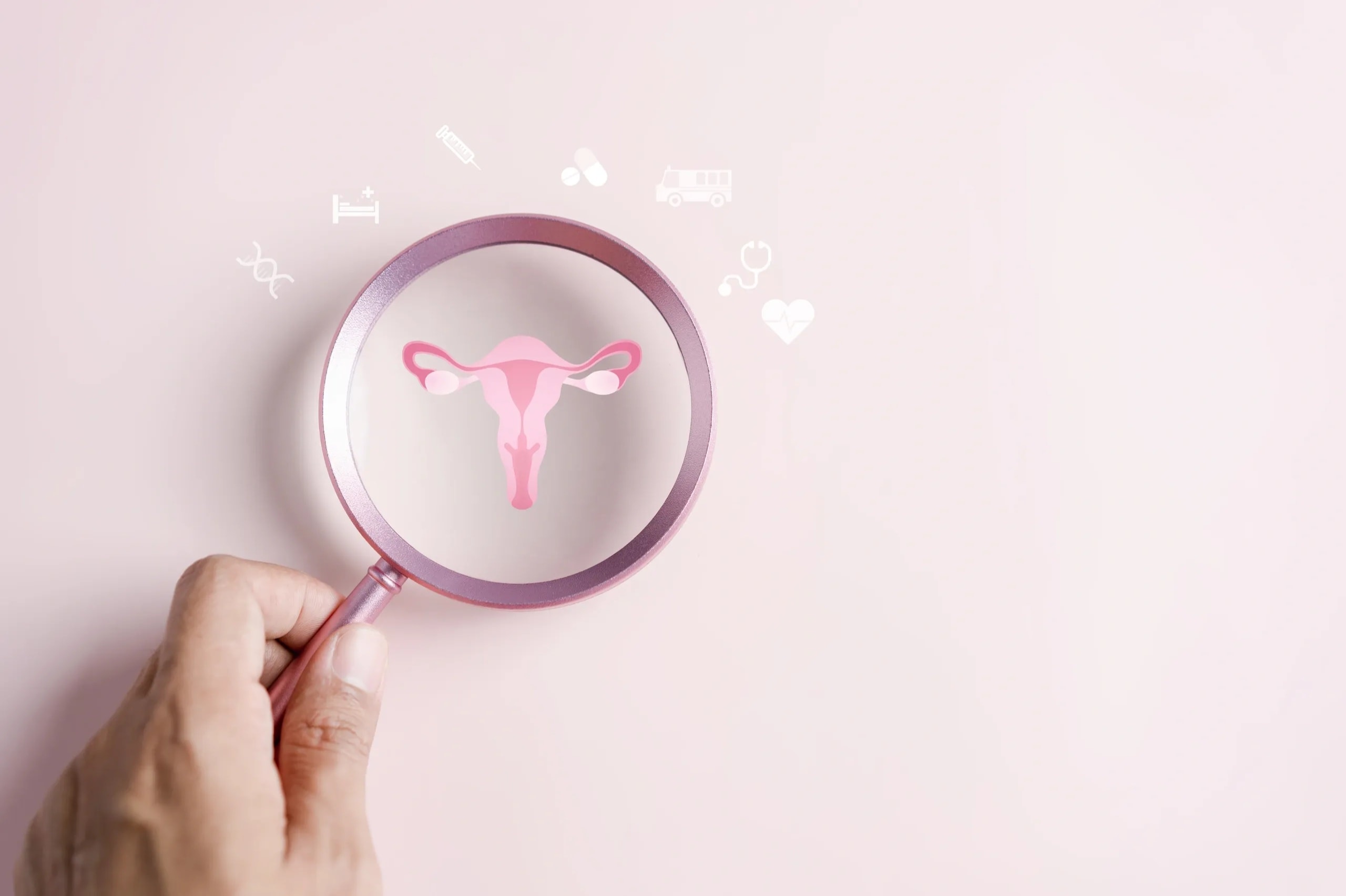 Magnifying glass revealing uterus reproductive health illustration